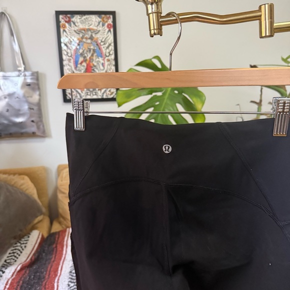Black 25 inch lululemon leggings - sheer detailing - Picture 2 of 7